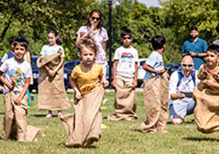kids jumping in sacks